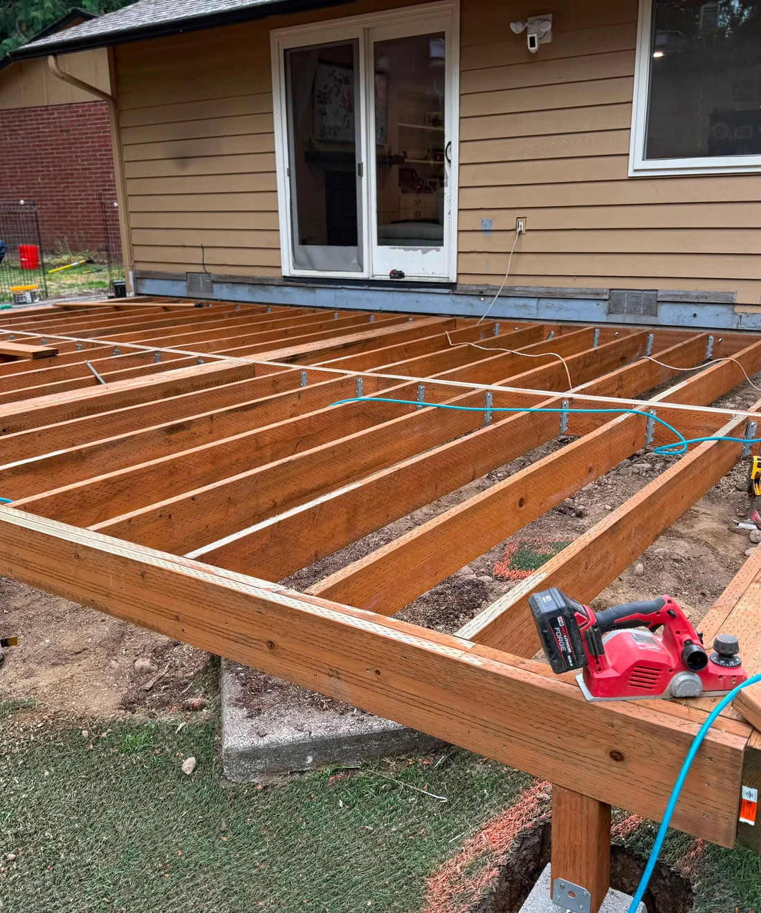 Deck framing built by our crew, joists ready for the decking boards
